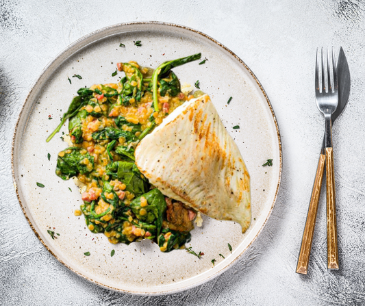 Turbot steak with yellow lentil dal and spinach