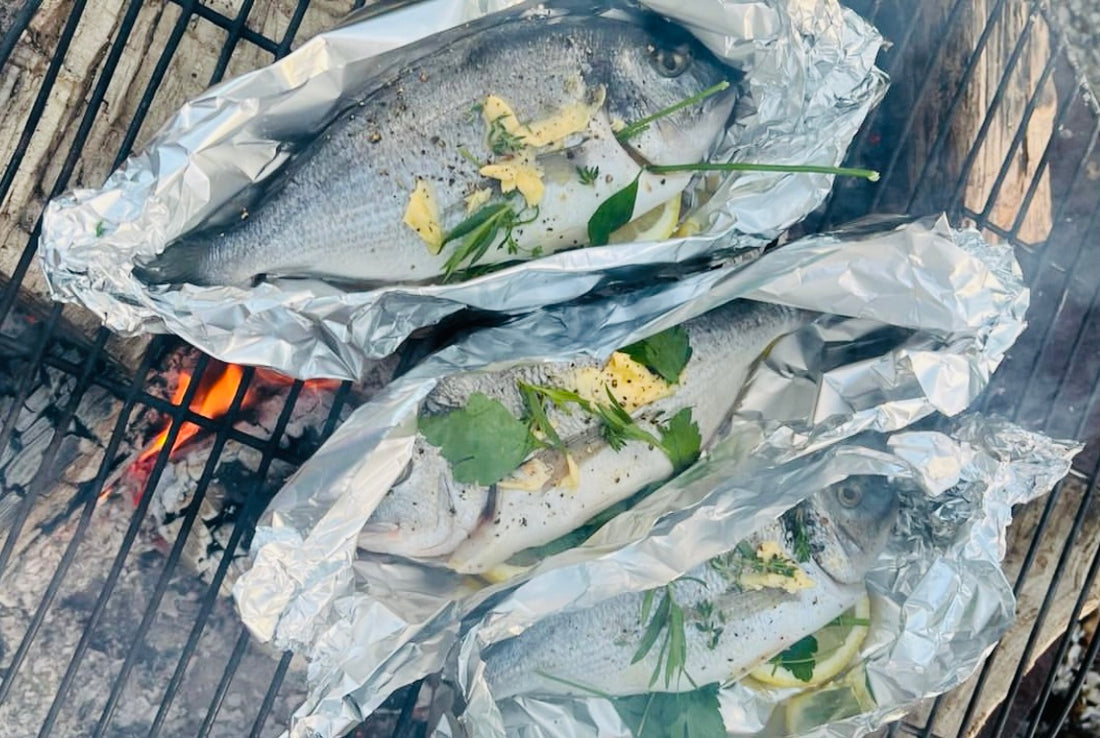  BBQ-grilled whole sea bream in kitchen foil