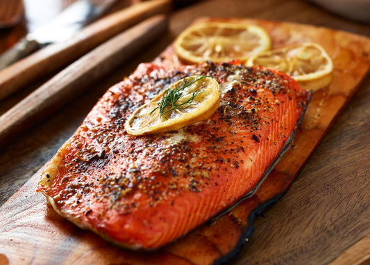 Cedar plank grilled whole salmon side a smokey spice rub