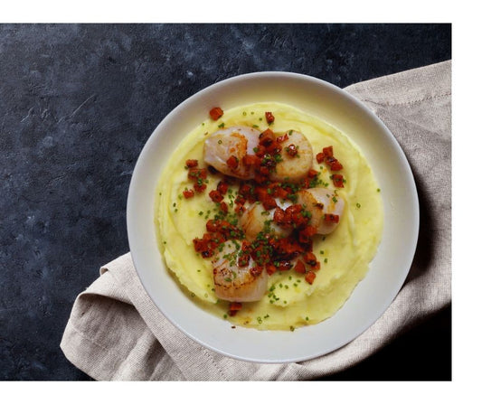 Pan-fried scallops and chorizo on a creamy cauliflower purée