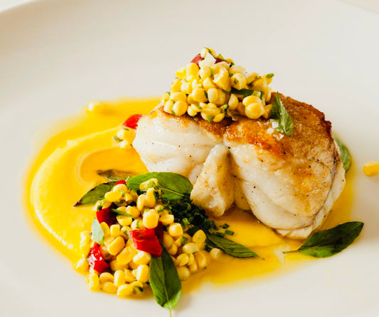 Pan-seared monkfish steaks with creamy sweetcorn coulis